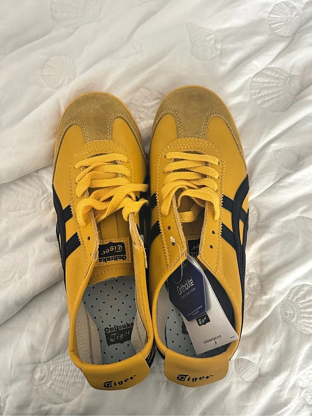 9/5 in men’s. Onitsuka Tiger Mexico 66 Sneakers